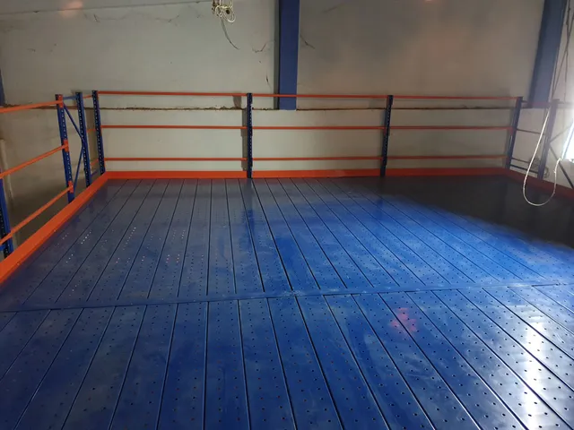 Shelving system with a mezzanine floor done for an apparel export company in Bibile — 3 of 11