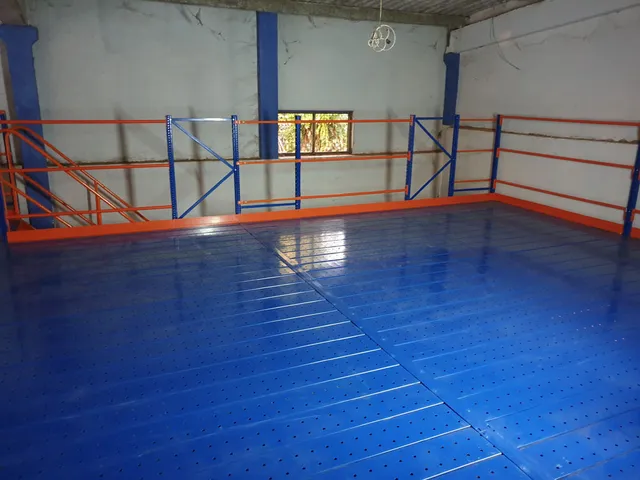 Shelving system with a mezzanine floor done for an apparel export company in Bibile — 4 of 11