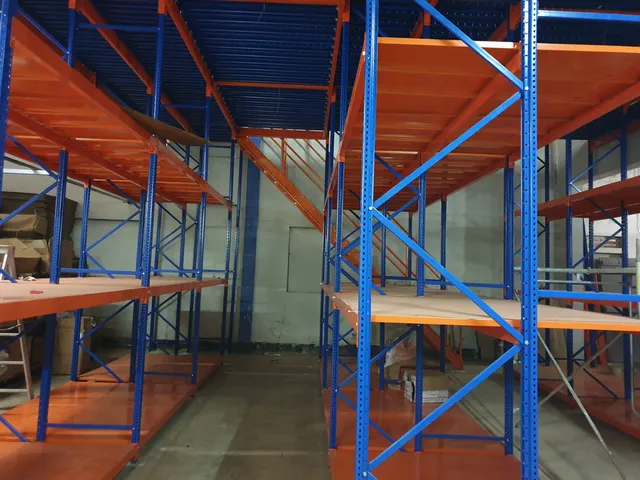 Shelving system with a mezzanine floor done for an apparel export company in Bibile — 6 of 11