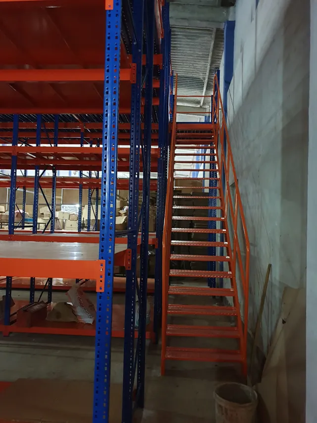 Shelving system with a mezzanine floor done for an apparel export company in Bibile — 7 of 11