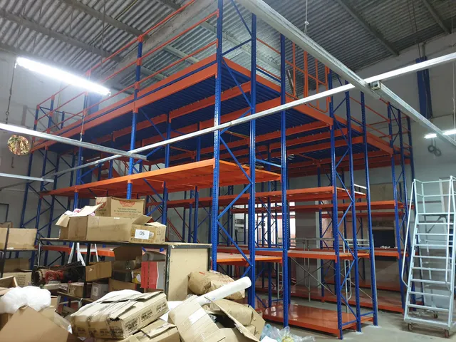 Shelving system with a mezzanine floor done for an apparel export company in Bibile — 8 of 11