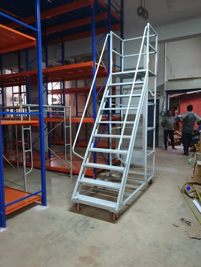 Shelving system with a mezzanine floor done for an apparel export company in Bibile — 10 of 11