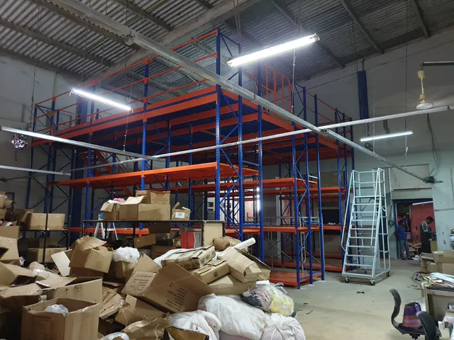 Shelving system with a mezzanine floor done for an apparel export company in Bibile — 11 of 11