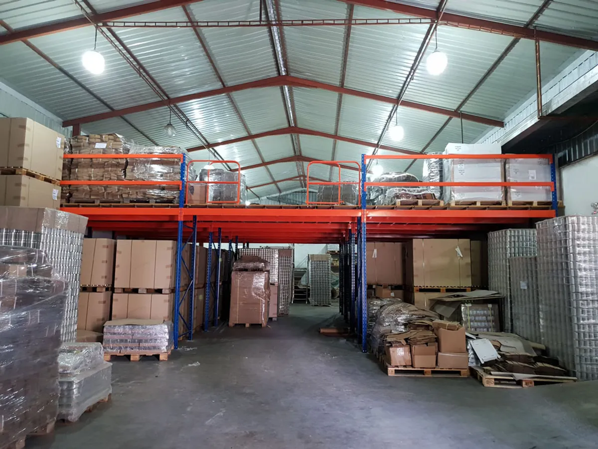 Frame supported mezzanine floor to store packing material for a Coconut products export company in Dankotuwa