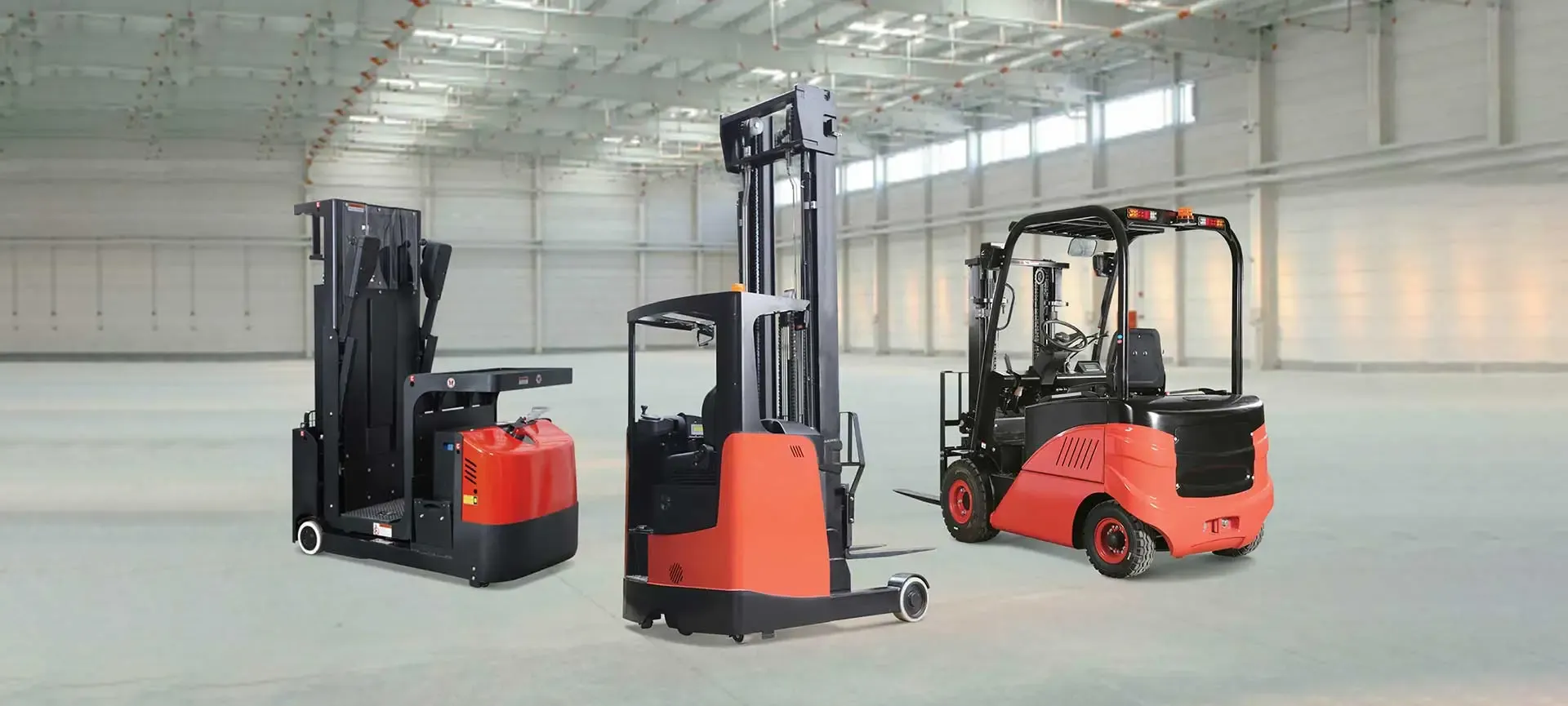 Electric forklift, reach truck and stacker in an empty warehouse