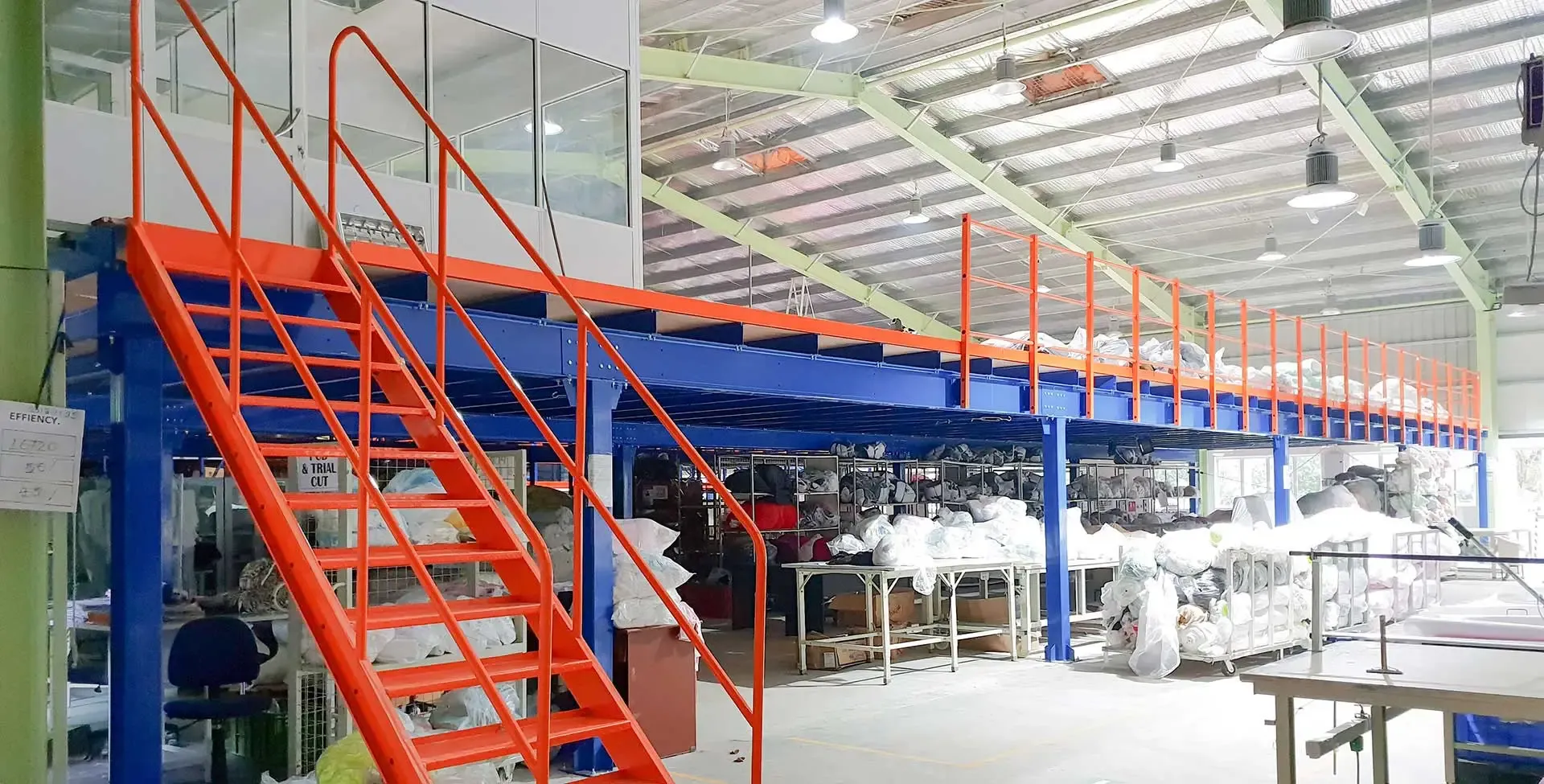 Steel mezzanine floor with staircase installed in a garment factory